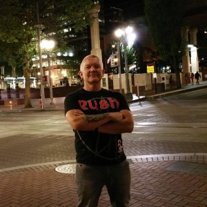 Lance Hardy in a RUSH t-shirt